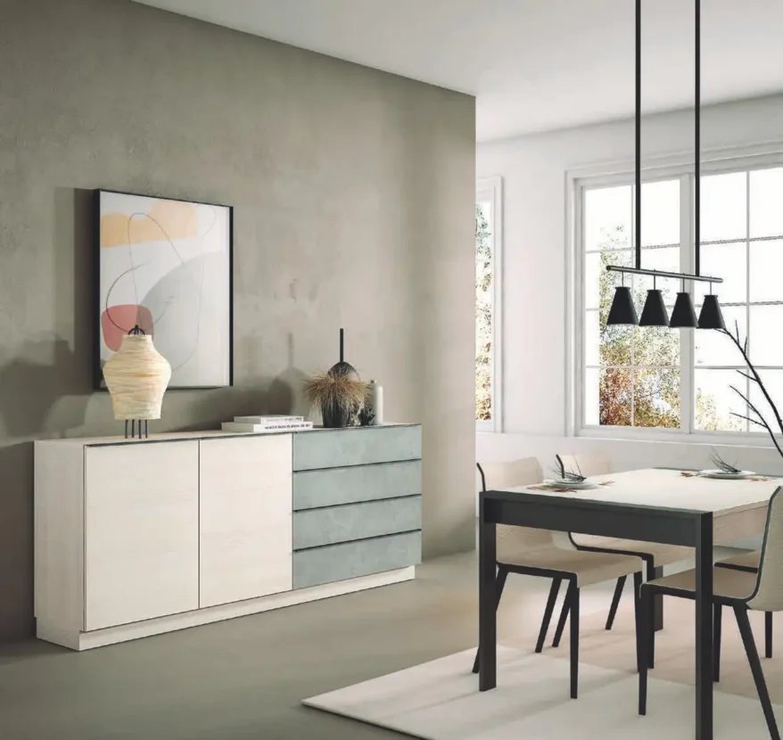 Salón moderno con aparador blanco y azul, mesa negra y sillas de madera - Muebles Hermanos Herrera